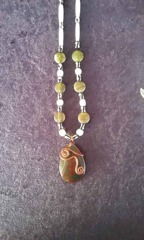 Hand made necklace with wire wrapped agate